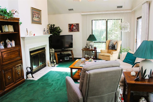 1 Rose Ct, East Islip, NY 11730 - living area featuring a fireplace with flush hearth and carpet