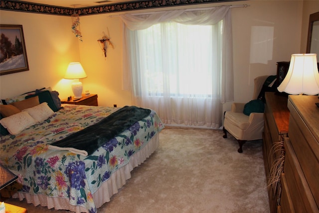 1 Rose Ct, East Islip, NY 11730 - bedroom with multiple windows and carpet floors