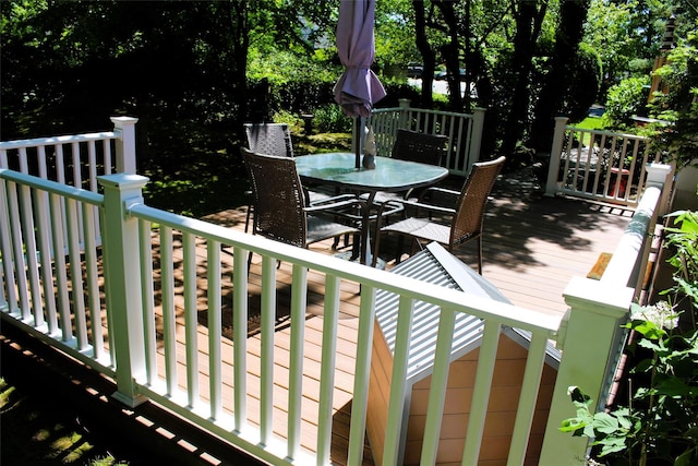 1 Rose Ct, East Islip, NY 11730 - wooden terrace featuring outdoor dining area