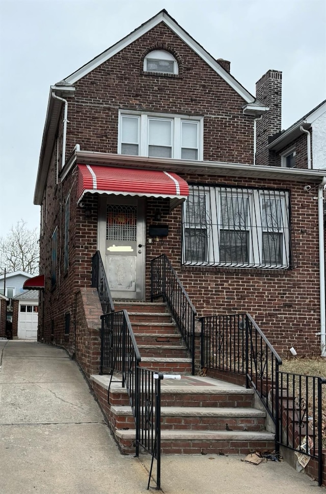 59-32 163rd St, Fresh Meadows, NY 11365 - view of front facade with brick siding