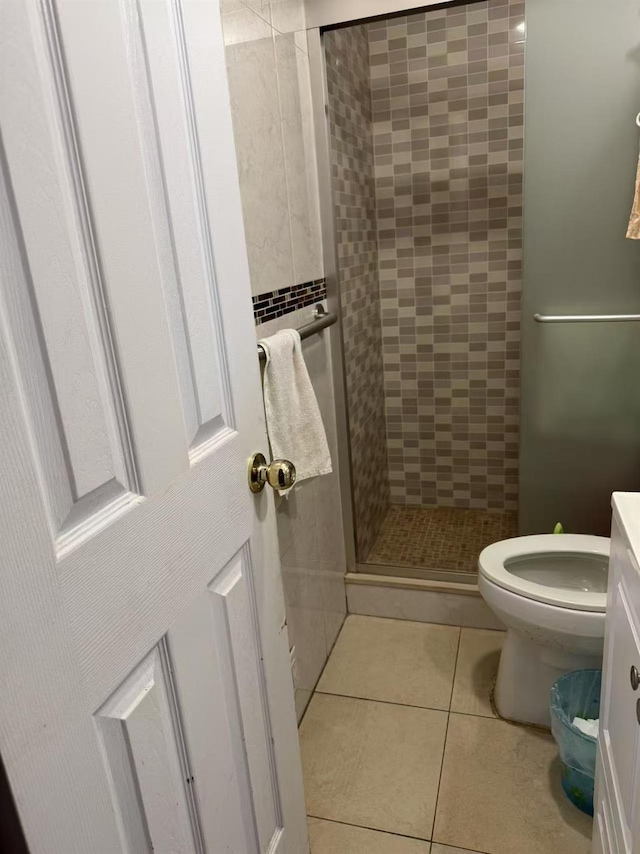 59-32 163rd St, Fresh Meadows, NY 11365 - full bath featuring a shower stall, tile walls, toilet, and tile patterned flooring
