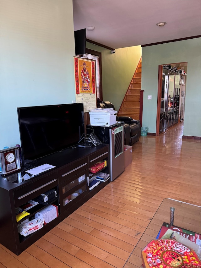 59-32 163rd St, Fresh Meadows, NY 11365 - living room featuring light wood-style floors and stairway