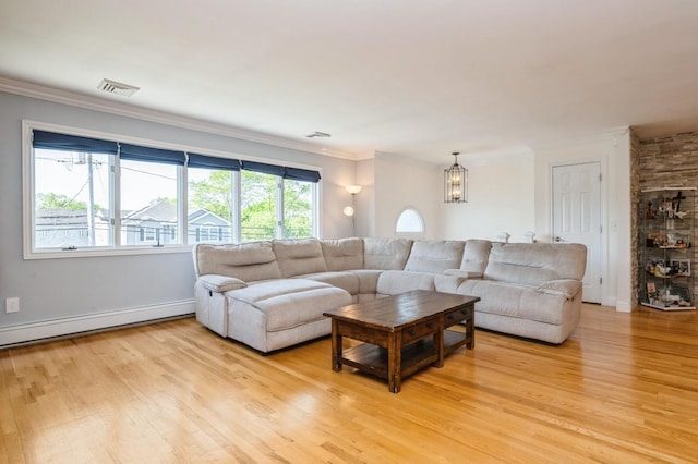 2033 Waltoffer Ave, North Bellmore, NY 11710 - living area with baseboard heating, light wood-style flooring, a chandelier, crown molding, and baseboards