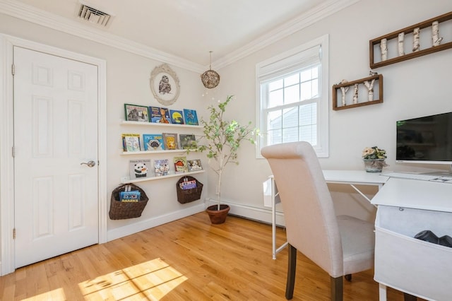 2033 Waltoffer Ave, North Bellmore, NY 11710 - office space with wood finished floors, a baseboard radiator, crown molding, and baseboards
