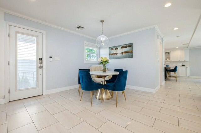 2033 Waltoffer Ave, North Bellmore, NY 11710 - dining area with baseboards, crown molding, and recessed lighting