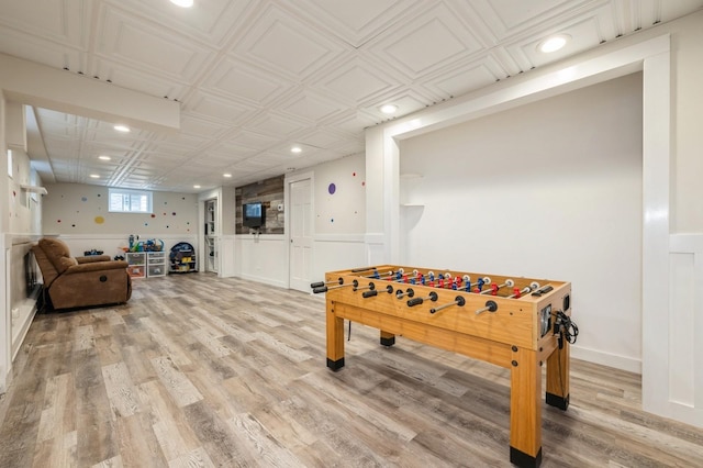 2033 Waltoffer Ave, North Bellmore, NY 11710 - playroom with recessed lighting, light wood-type flooring, and a wainscoted wall