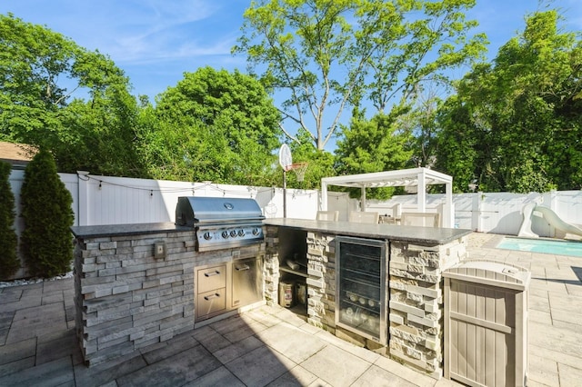 2033 Waltoffer Ave, North Bellmore, NY 11710 - fenced backyard with wine cooler and a patio area