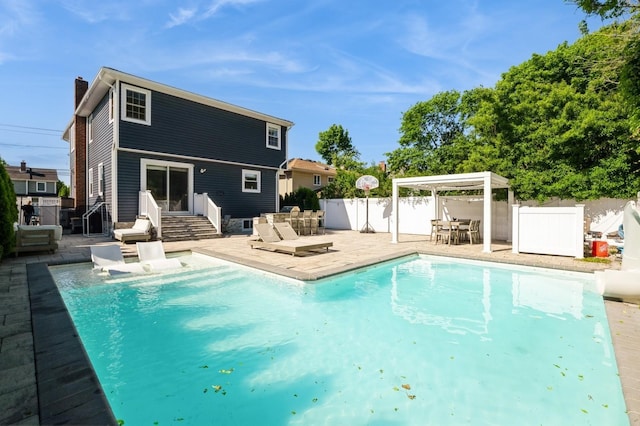 2033 Waltoffer Ave, North Bellmore, NY 11710 - rear view of property featuring a patio area, a chimney, and outdoor dining space