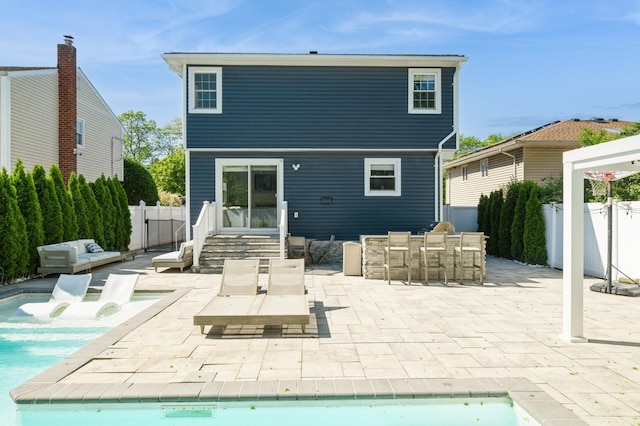 2033 Waltoffer Ave, North Bellmore, NY 11710 - back of house featuring a patio