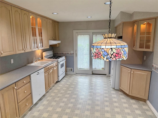 50 Mills Pond Rd, Saint James, NY 11780 - kitchen with white appliances, under cabinet range hood, a sink, light floors, and baseboards