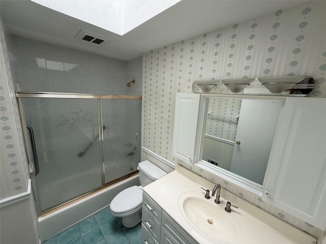 50 Mills Pond Rd, Saint James, NY 11780 - bathroom with enclosed tub / shower combo, vanity, toilet, a skylight, and wallpapered walls