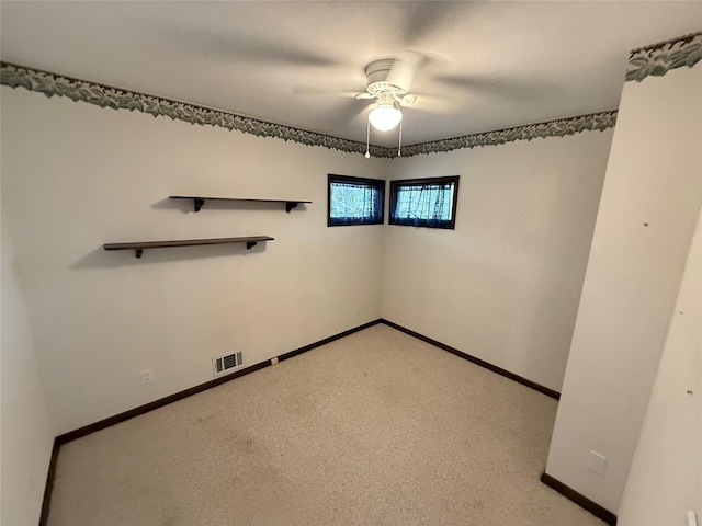 50 Mills Pond Rd, Saint James, NY 11780 - unfurnished room featuring a ceiling fan, baseboards, and light carpet