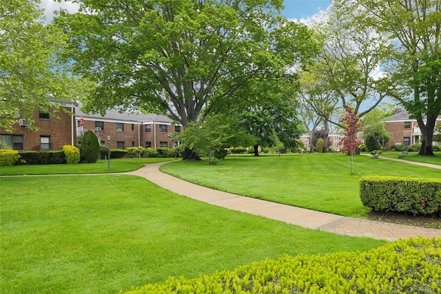 1213 E Broadway Unit B25, Hewlett, NY 11557 - view of property's community featuring a lawn