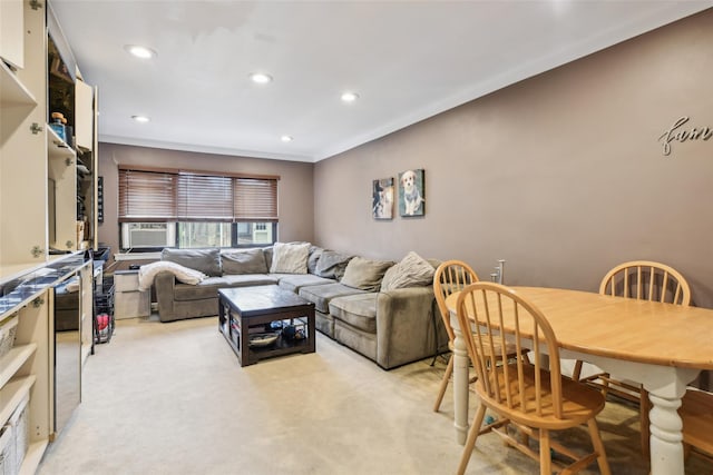 1213 E Broadway Unit B25, Hewlett, NY 11557 - living area featuring light colored carpet, recessed lighting, and crown molding
