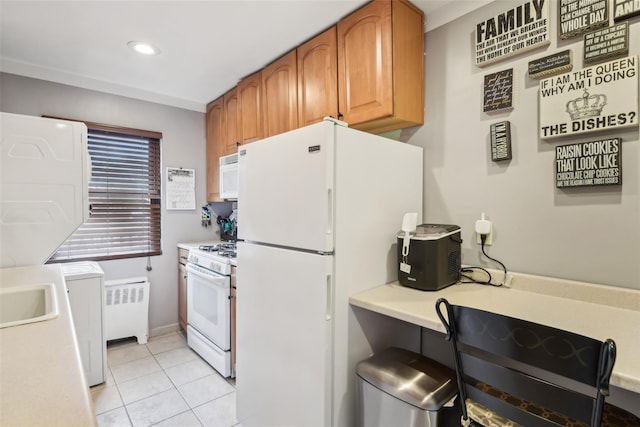 1213 E Broadway Unit B25, Hewlett, NY 11557 - kitchen with white appliances, light countertops, light tile patterned floors, radiator, and recessed lighting