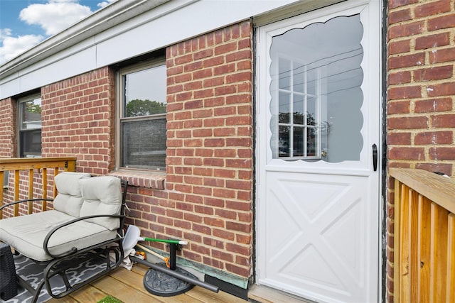 1213 E Broadway Unit B25, Hewlett, NY 11557 - doorway to property featuring brick siding