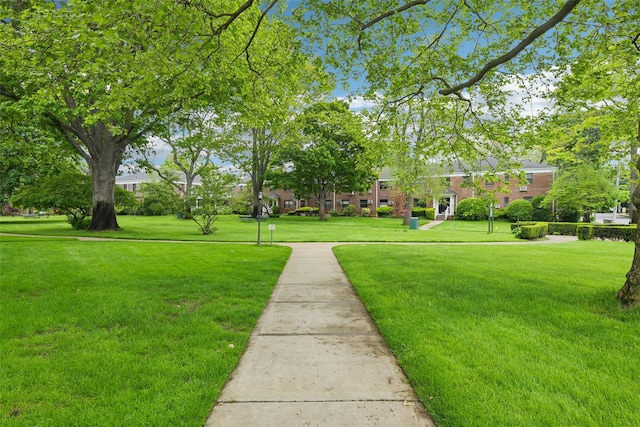 1213 E Broadway Unit B25, Hewlett, NY 11557 - view of community featuring a yard