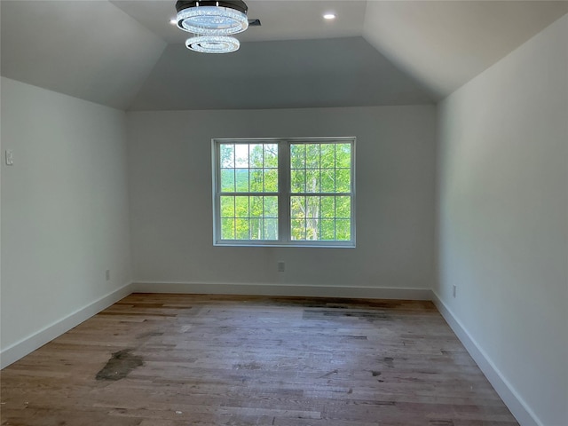 26 Rodina Dr, Pawling, NY 12564 - additional living space featuring vaulted ceiling, baseboards, wood finished floors, and a chandelier