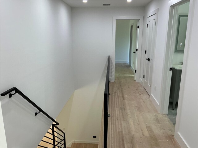 26 Rodina Dr, Pawling, NY 12564 - hall featuring an upstairs landing, light wood-type flooring, baseboards, and recessed lighting