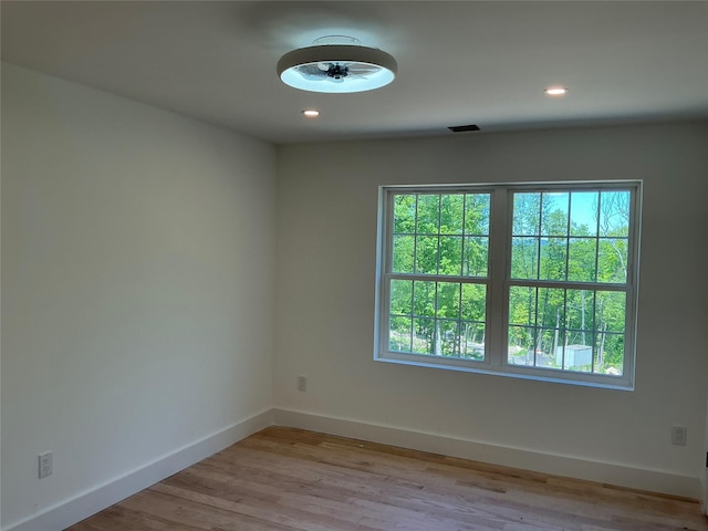26 Rodina Dr, Pawling, NY 12564 - spare room featuring plenty of natural light, baseboards, light wood-type flooring, and recessed lighting