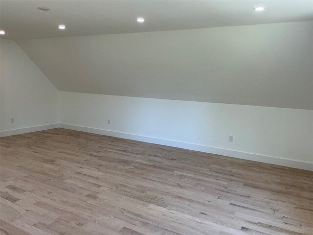 26 Rodina Dr, Pawling, NY 12564 - bonus room with light wood-type flooring, vaulted ceiling, baseboards, and recessed lighting