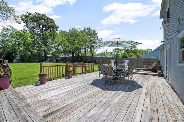 8 Meyer Ln, Medford, NY 11763 - wooden deck with a playground and outdoor dining area