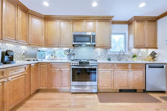 29 Cross Bow Ln, Commack, NY 11725 - kitchen featuring stainless steel appliances, a sink, light countertops, decorative backsplash, and recessed lighting