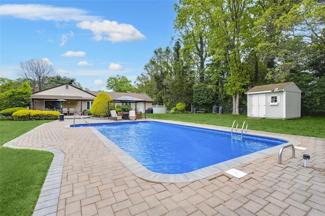 29 Cross Bow Ln, Commack, NY 11725 - swimming pool with a gazebo, a patio area, a lawn, and view of wooded area