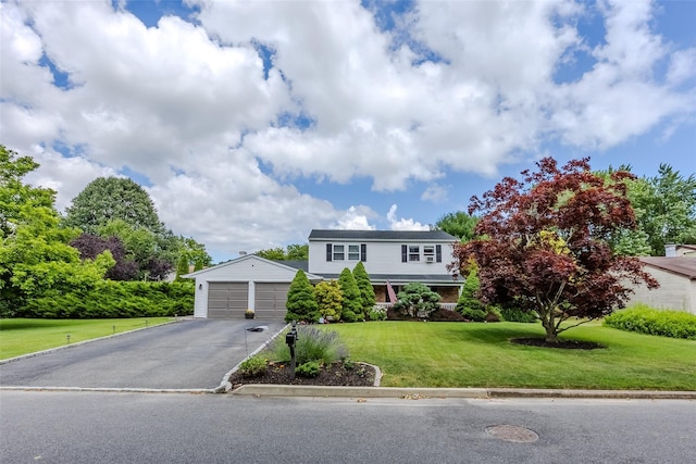 17 Daytona Beach Pl, Coram, NY 11727 - traditional-style house featuring a front yard and a garage