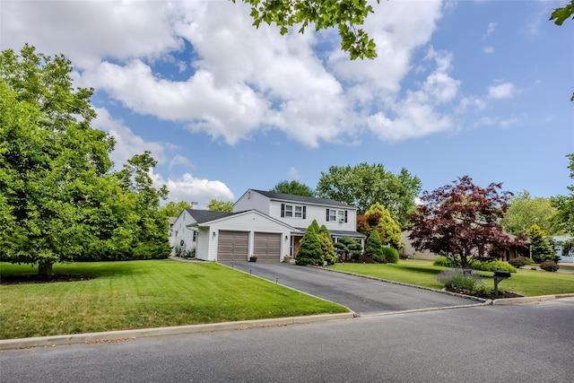 17 Daytona Beach Pl, Coram, NY 11727 - traditional-style home with an attached garage, a front lawn, and asphalt driveway