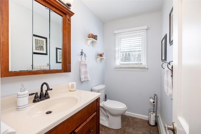 17 Daytona Beach Pl, Coram, NY 11727 - bathroom featuring toilet, vanity, tile patterned flooring, and baseboards