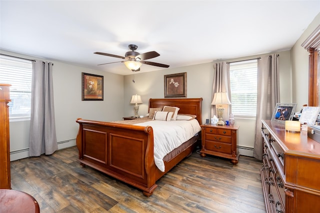 17 Daytona Beach Pl, Coram, NY 11727 - bedroom featuring multiple windows, dark wood-style flooring, and a baseboard radiator
