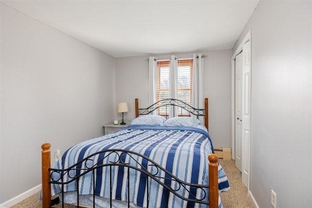 17 Daytona Beach Pl, Coram, NY 11727 - carpeted bedroom with baseboards and baseboard heating