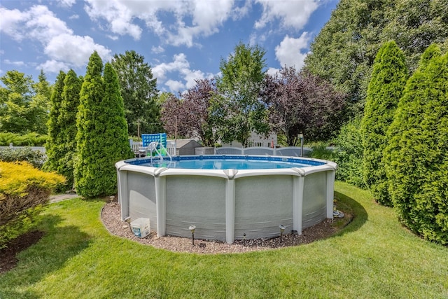 17 Daytona Beach Pl, Coram, NY 11727 - outdoor pool with a yard