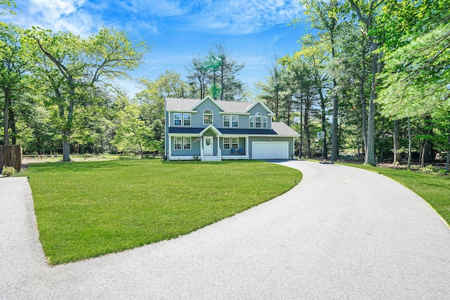 59 Middle Island Blvd, Middle Island, NY 11953 - view of front facade featuring covered porch, driveway, and view of wooded area