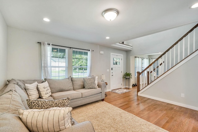 59 Middle Island Blvd, Middle Island, NY 11953 - living room with light wood-type flooring, stairway, baseboards, and recessed lighting