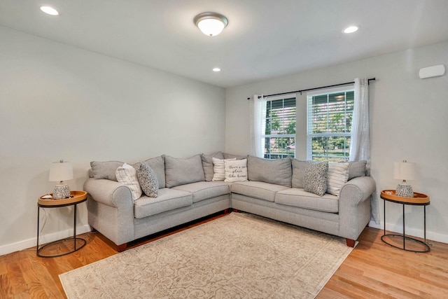 59 Middle Island Blvd, Middle Island, NY 11953 - living area featuring light wood-type flooring, recessed lighting, and baseboards