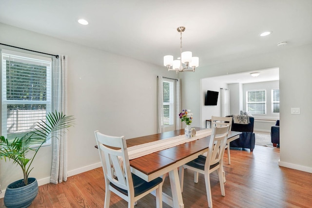 59 Middle Island Blvd, Middle Island, NY 11953 - dining room featuring a chandelier, light wood-type flooring, baseboards, and recessed lighting