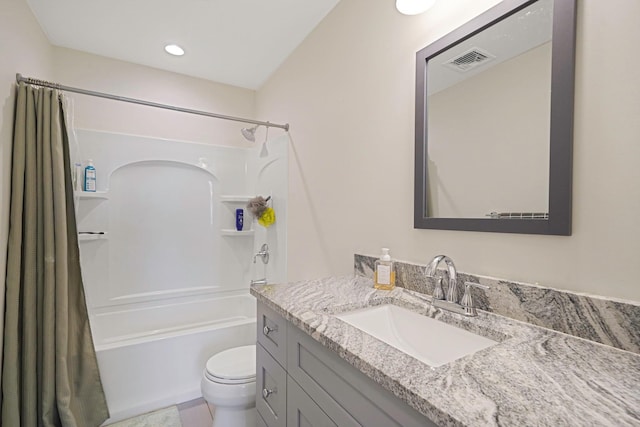 59 Middle Island Blvd, Middle Island, NY 11953 - bathroom featuring vanity, shower / bath combo with shower curtain, toilet, and recessed lighting