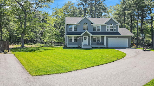 59 Middle Island Blvd, Middle Island, NY 11953 - colonial-style house with driveway, a garage, and covered porch