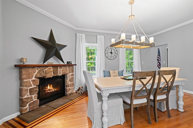8 Roosa Rd, Wallkill, NY 12589 - dining room featuring a chandelier, wood finished floors, crown molding, a fireplace, and baseboards