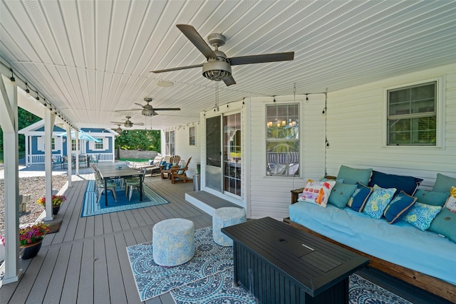 8 Roosa Rd, Wallkill, NY 12589 - wooden deck with an outdoor living space, outdoor dining space, and a ceiling fan