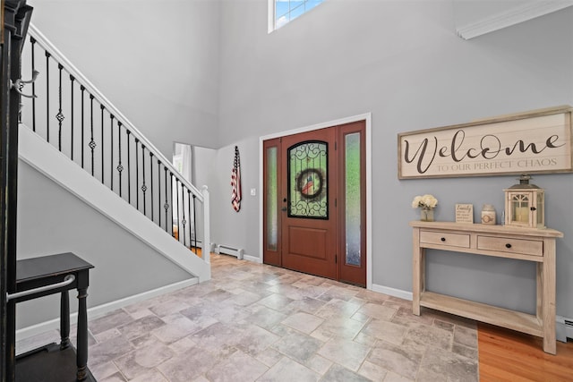 8 Roosa Rd, Wallkill, NY 12589 - foyer featuring a high ceiling, a baseboard heating unit, baseboards, stairway, and stone finish flooring