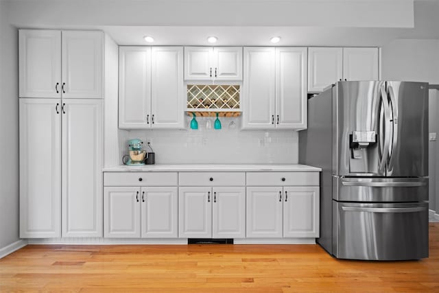 8 Roosa Rd, Wallkill, NY 12589 - kitchen featuring stainless steel fridge, white cabinets, light countertops, and recessed lighting