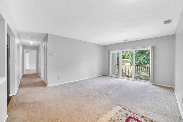 32 Huntington Cir Building 19, Peekskill, NY 10566 - carpeted spare room featuring a textured ceiling and baseboards