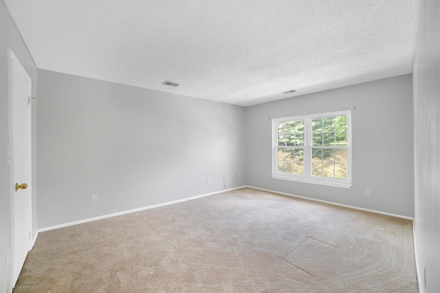 32 Huntington Cir Building 19, Peekskill, NY 10566 - carpeted spare room with a textured ceiling and baseboards