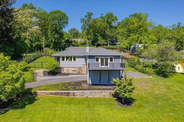530 N Midland Ave N, Nyack, NY 10960 - rear view of property with a balcony and view of scattered trees