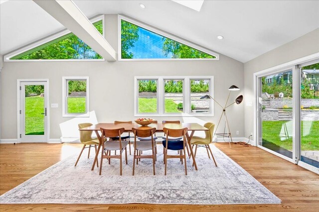 530 N Midland Ave N, Nyack, NY 10960 - dining room featuring baseboards, wood finished floors, healthy amount of natural light, high vaulted ceiling, and recessed lighting