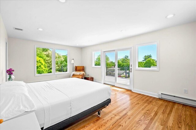 530 N Midland Ave N, Nyack, NY 10960 - bedroom featuring access to exterior, light wood-style floors, baseboards, recessed lighting, and a baseboard heating unit