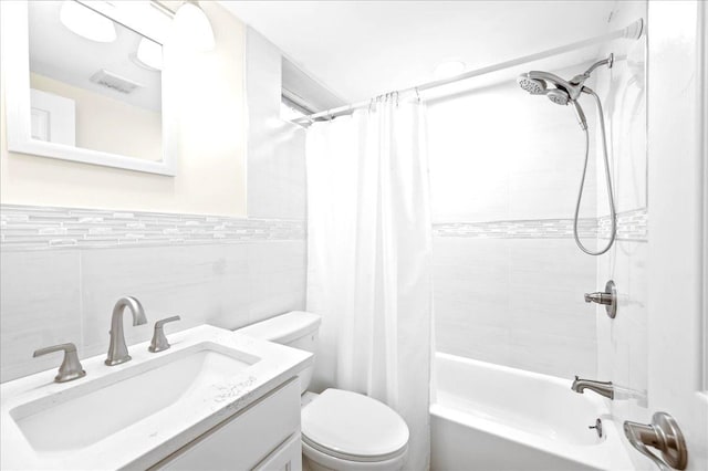 530 N Midland Ave N, Nyack, NY 10960 - full bath with tile walls, toilet, shower / bath combination with curtain, and vanity